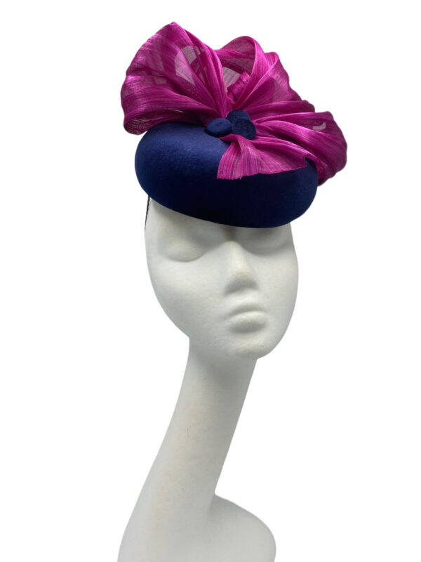 Gorgeous navy velvet headpiece with pink jinsin fan detail.